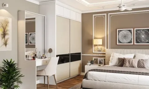 Floor-to-Ceiling Sliding Wardrobe with Champagne Trim